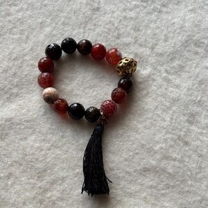 Elegant Beaded Bracelet with Tassel